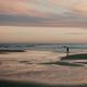 Waves crashing at Costa da Caparica beach.
