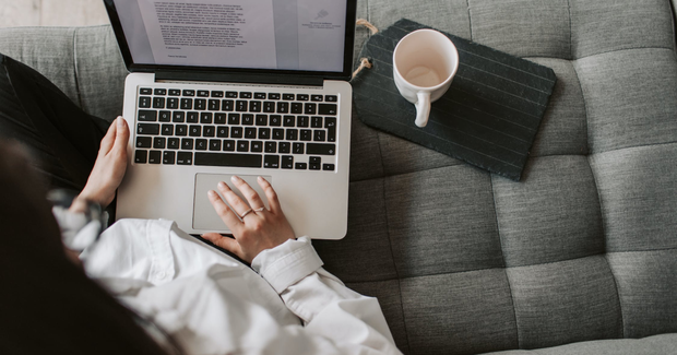 girl working on the couch