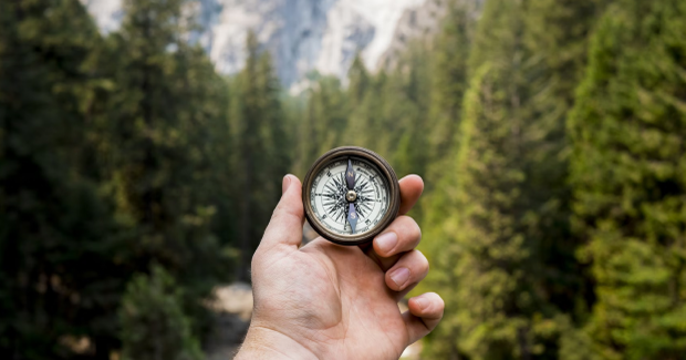 explorer with compass