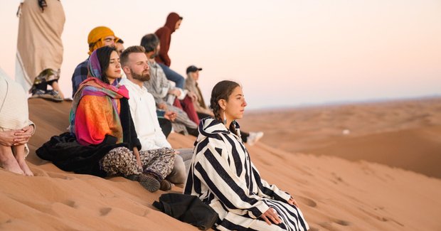 people on sand dunes