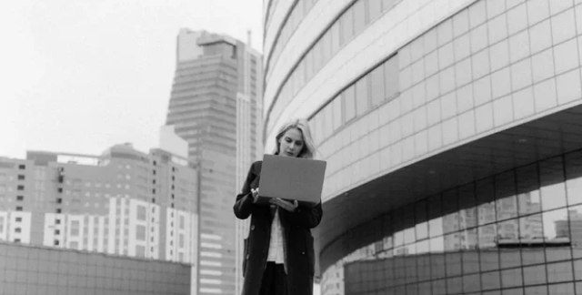 girl working outside building