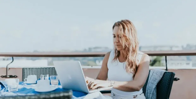 girl working on rooftop