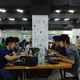 People working on their laptops in coworking space